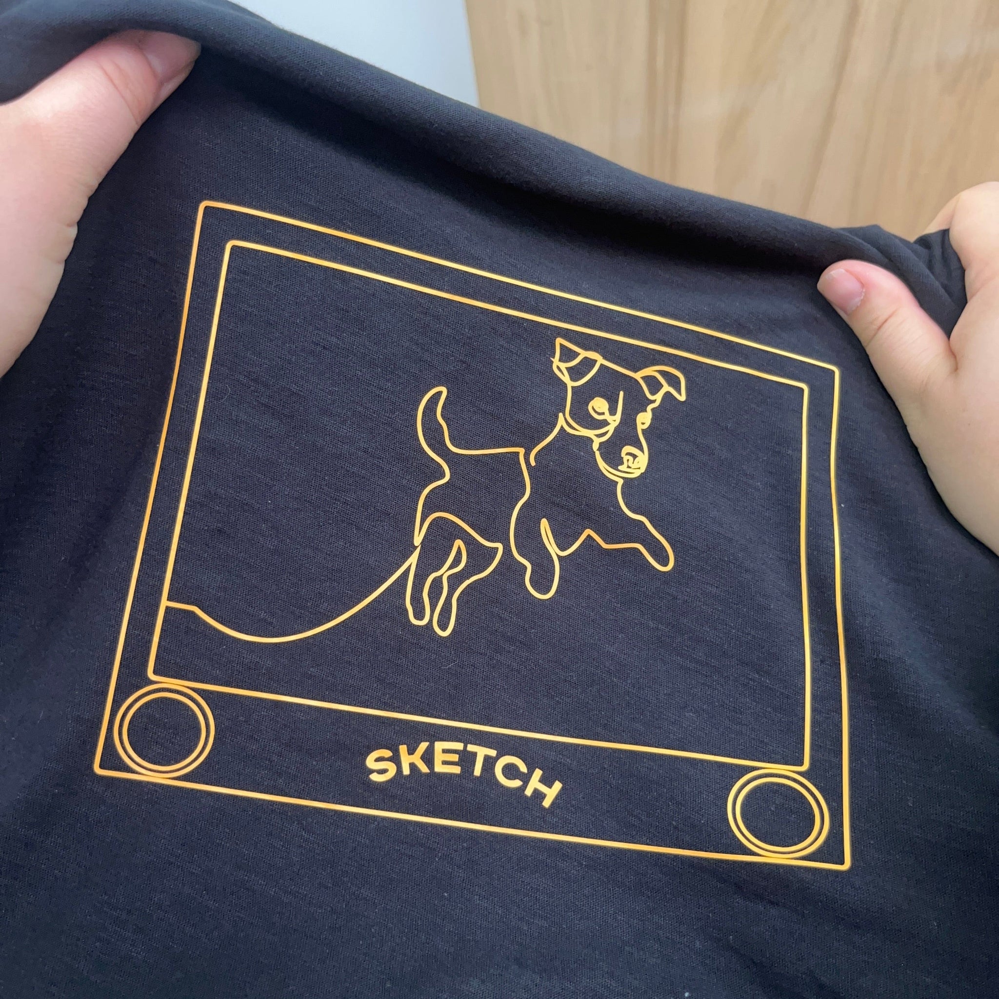 t shirt with dog in pocket